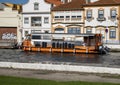 Twin-engine motorboat for tourist cruises on the canals of Aveiro, the Venice of Portugal. Royalty Free Stock Photo