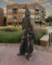 Life-size bronze sculpture of Caddo chief by Linda Lewis, part of an art piece titled `The Peace Circle` in historic Grapevine. Royalty Free Stock Photo