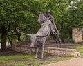 Cowboy on horseback bronze sculpture by Anita Pauwels, part of  a public art installation titled `Cattle Drive` in Central Park Royalty Free Stock Photo