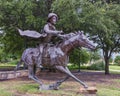 Cowboy on horseback, a bronze sculpture by Anita Pauwels, part of a public art installation titled `Cattle Drive` in Central Park