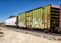 Train car with graffiti rolling through Marfa, Texas. Royalty Free Stock Photo