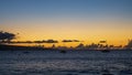 Hawaiian sunset viewed from Mala Tavern in the city of Lahaina on the island of Maui in the state of Hawaii. Royalty Free Stock Photo