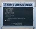 Mass and confessions schedule Saint Mary`s Catholic Church in Marfa, Texas. Royalty Free Stock Photo