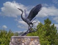 Bronze sculpture titled Great Blue Heron by Raymond Gibby in Tulsa, Oklahoma.