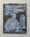 Mosaic mural titled `In Memory of John` in the beer garden of Dot`s Hop House & Cocktail Court in Deep Ellum, Texas.