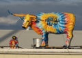 Multicolored Texas longhorn steer statue used as a sign for Strokers in Dallas, Texas.