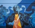 Mural in Deep Ellum Blues Alley featuring Andrew `Jr Boy` Jones, a legendary blues guitar player.