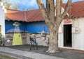 Pictured is a mural and the entrance to Se Vende, a shop with only a vending machine inside in Marfa, Texas. Royalty Free Stock Photo