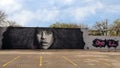 Mural of Erykah Badu by renowned artist Ponchaveli on the outside wall of a building near Fair Park in Dallas, Texas