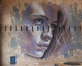 Mural on a brick wall in Deep Ellum, Texas by Amarillo based street artist Malcom Byers. Royalty Free Stock Photo