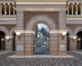 Mural featuring steam locomotive 2248, nicknamed Puffy, by SaxonLynn Arts on the front facade of the Grapevine Main building.