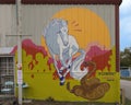 White stallion and rattlesnake mural by Brooklynd Turner for Wild West Mural Fest 2020 in West Dallas, Texas.