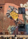 Mural featuring a woman on a horse on a restaurant wall in the Bishop Arts District in Oak Cliff in Dallas, Texas