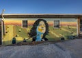 Mural on outside wall of Kith & Kin Hair Company in Fayetteville, Arkansas. Royalty Free Stock Photo