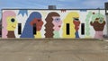 Mural titled \'Monumental Women\' by Emily Eldridge in downtown Edmond, Oklahoma.