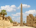 Thutmose I Obelisk with the 3rd Pylon and Amenhotep III Court in the background in the Karnak Temple complex near Luxor, Egypt. Royalty Free Stock Photo