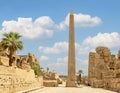 Thutmose I Obelisk with the 3rd Pylon and Amenhotep III Court in the background in the Karnak Temple complex near Luxor, Egypt.