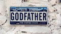 Novelty license plate featuring New York, Godfather, and The Empire State.