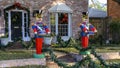 Nutcracker Solidiers holding drums standing guard protecting a house in Dallas, Texas