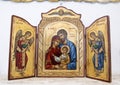 Joseph, Mary and child with Archangels on altar in small church at Masseria Il Frantoio, Southern Italy