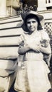 Old photo of Annabel Lee McClary as a child with a kitten under each arm. Royalty Free Stock Photo