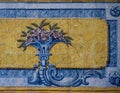 Blue, yellow and green azulejo tile panels on the side walls of the refectory of the Jeronimos Monastery in Lisbon, Portugal.