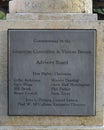 One of four plaques on `Walking to Texas` by sculptor Michael Cunnigham in the historic district of Grapevine, Texas. Royalty Free Stock Photo