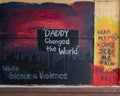 Painted plywood mural with anti-racism theme in Deep Ellum, Dallas, during the George Floyd protests.