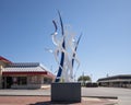 Figurative steel sculpture by Joshua Weiner on 15th Street in Plano, Texas.