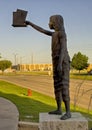 \'Journeys of the Mind\' bronze sculpture by Jack Wilson outside the Main Library of Grand Prairie, Texas.