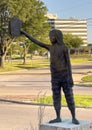 \'Journeys of the Mind\' bronze sculpture by Jack Wilson outside the Main Library of Grand Prairie, Texas.