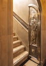 Silver relief door at the entrance to the stairway leading to the shrine of Our Lady of Montserrat. Royalty Free Stock Photo