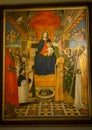 Mary with Jesus on a throne in The Pinacota Ambrosiana, the Ambrosian art gallery in Milan, Italy