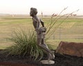 Bronze sculpture titled `Share the Dream` by sculptor Dennis Smith at the Founder`s Plaza Observation Area at DFW Airport. Royalty Free Stock Photo