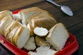 Sliced white bread on the old table.