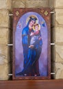 Madonna & Child on the back of the center stage in Saint Simon the Tanner`s Hall, in the Mokattam Mountains, Cairo region. Royalty Free Stock Photo