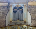 Pipe organ in the church of Santa Maria Sopra Minerva in the Communal Square of Assisi in Italy. Royalty Free Stock Photo