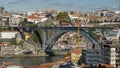 The Ponte Dom Luis I Bridge over the River Douro and the historic neighborhood Ribeira in Porto, Portugal. Royalty Free Stock Photo