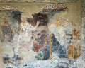 Poorly preserved 14th century fresco of the Adoration of the Three Wise Men in the Church of St. John the Baptist in Varenna.