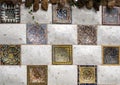 Portion of a mosaic tiled wall flanking entry staircase to Park Guell in Barcelona, Spain.. Royalty Free Stock Photo