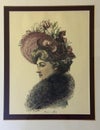 Print of a woman dressed in Viennese fashion in the early 1800s on display in the Villa Marsili in Cortana, Italy.