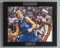 Lebron James guards Dirk Nowitzki in 2011 NBA Finals between Dallas Mavericks and Miami Heat. Royalty Free Stock Photo