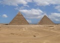 The Pyramid of Khafre and The Great Pyramid of Khufu photographed from the 9 Pyramids Lounge in Giza, Egypt. Royalty Free Stock Photo