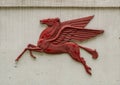 Red Pegasus horse relief on a wall in Fair Park in Dallas, Texas. Royalty Free Stock Photo