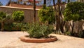 Rose bush and garden along the path leading from the gate to the Bahia Palace to the entrance to the main palace. Royalty Free Stock Photo