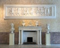 Relief above a collection of art pieces in the Museum of Villa Carlotta in Tremezzo. Royalty Free Stock Photo