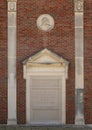 Relief with Galileo bust and quote on the outside wall of a building on the campus of Texas Woman`s University in Denton.