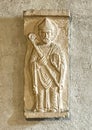 Relief of Saint Benedetto of Como in the Church of Saint George in Varenna. Royalty Free Stock Photo