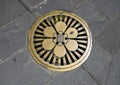 Brass Plate for access to underground electrical lines in Portofino, Italy.