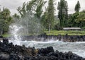 Rugged lava shoreline with crashing waves on the Hana side of the Island of Maui in the State of Hawaii.